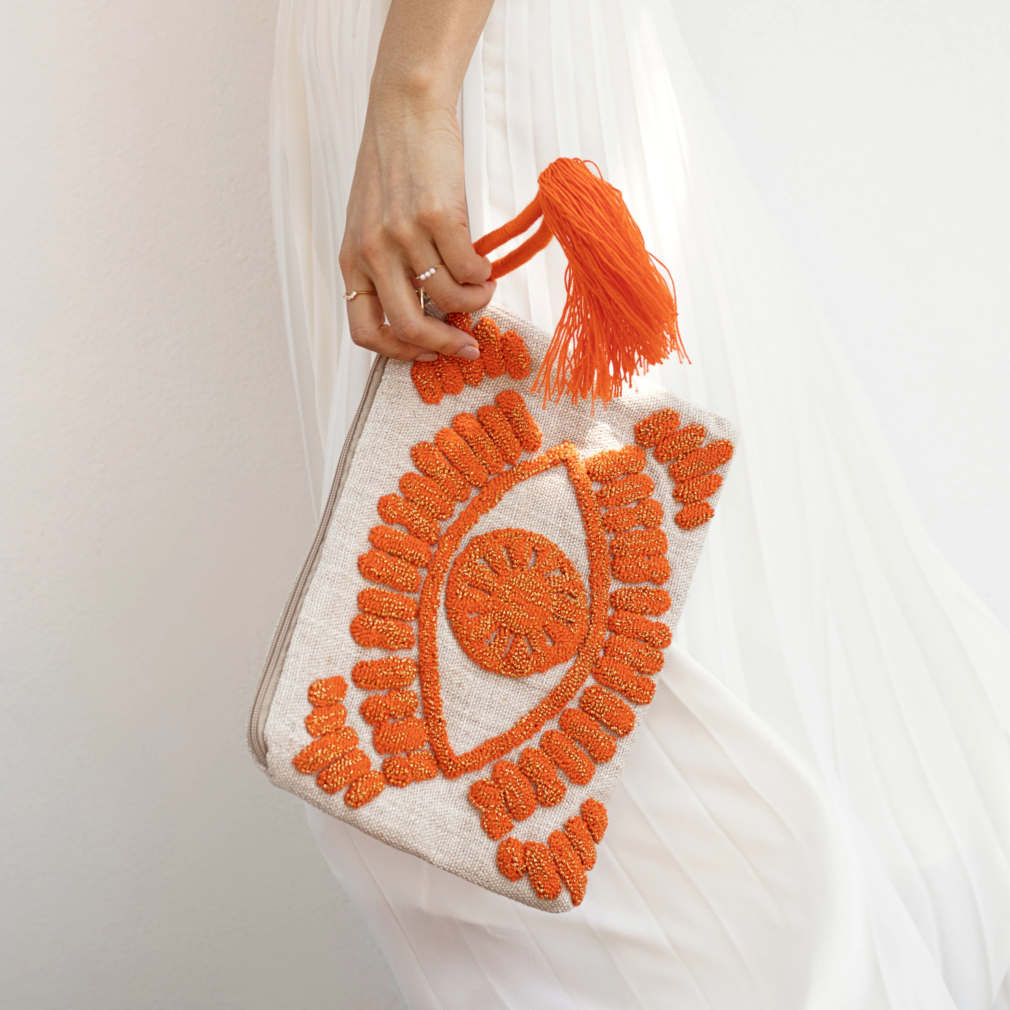 Evil eye linen clutch bag