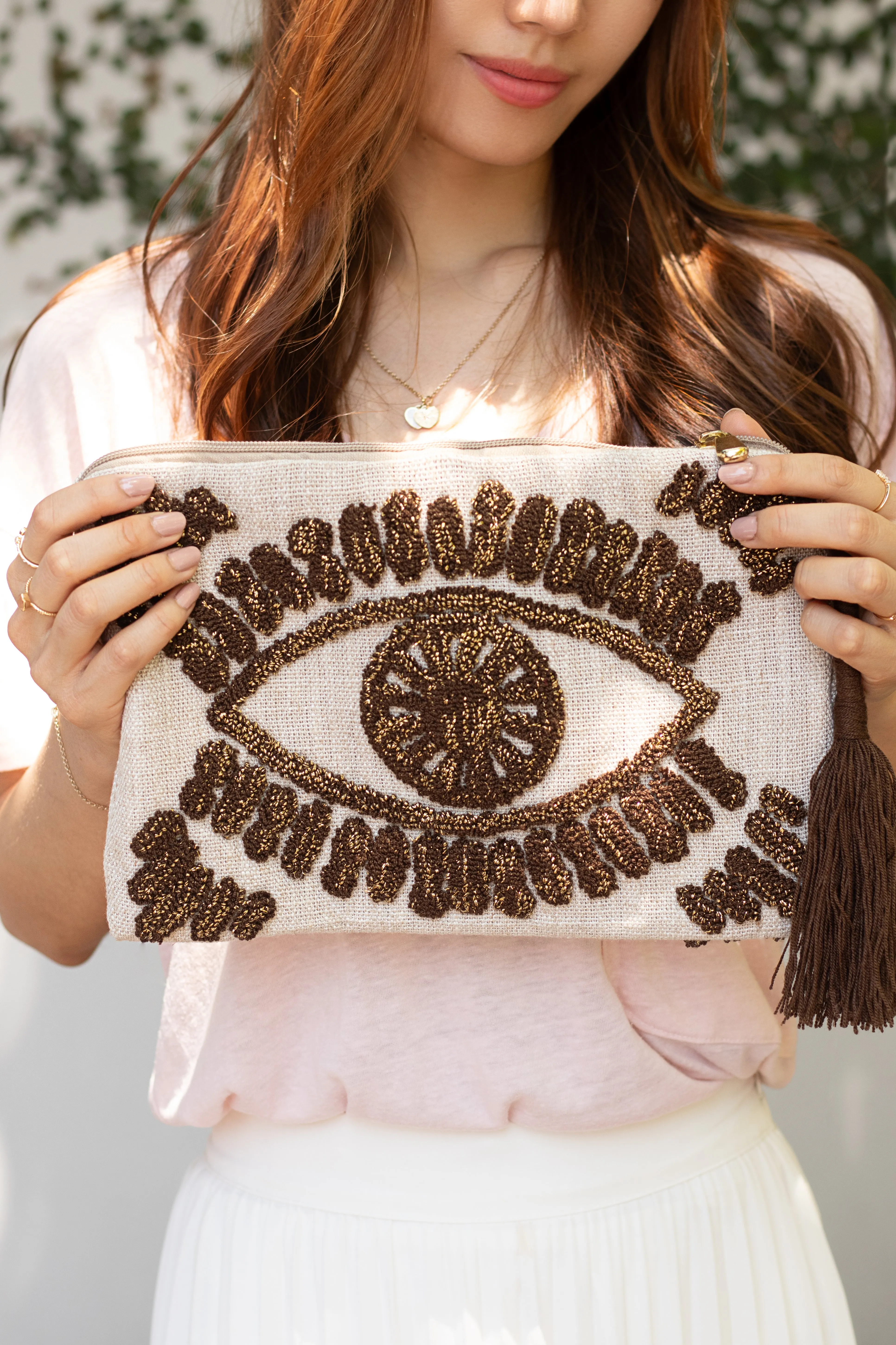 Evil eye linen clutch bag