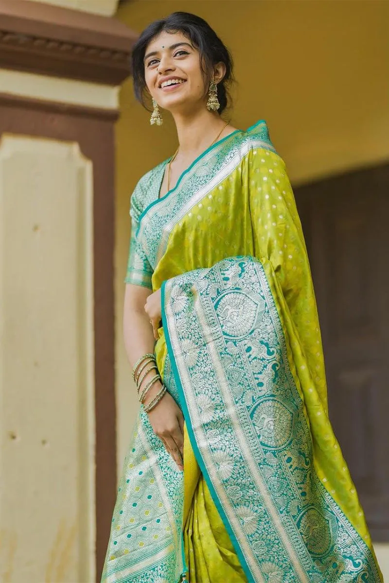Staggering Parrot Soft Silk Saree With Resplendent Blouse Piece