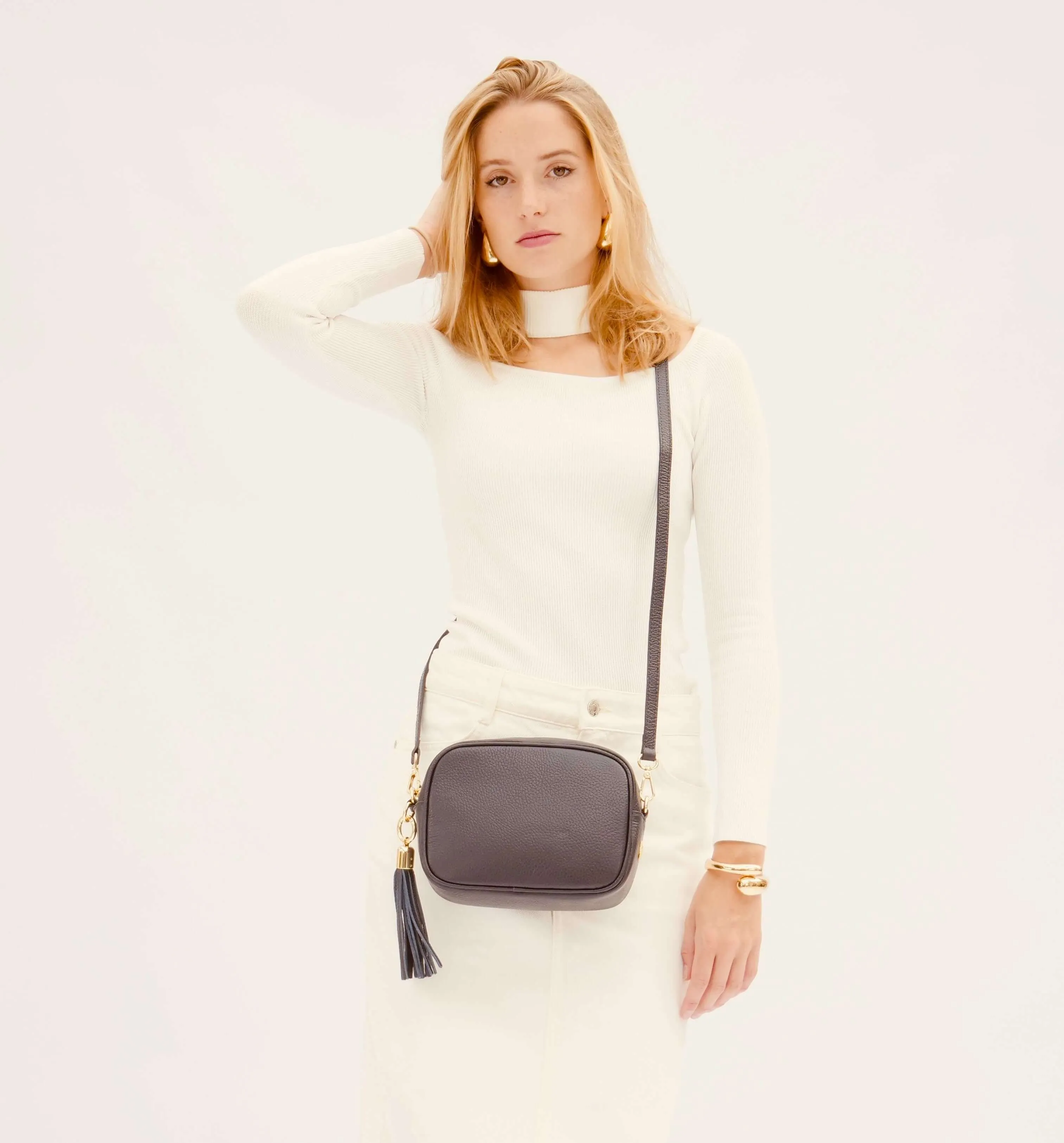 The Tassel Navy Leather Crossbody Bag With Denim Blue Chevron Strap